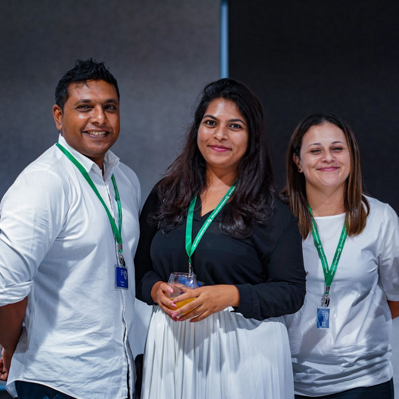 Attendees posing for photo - April Event